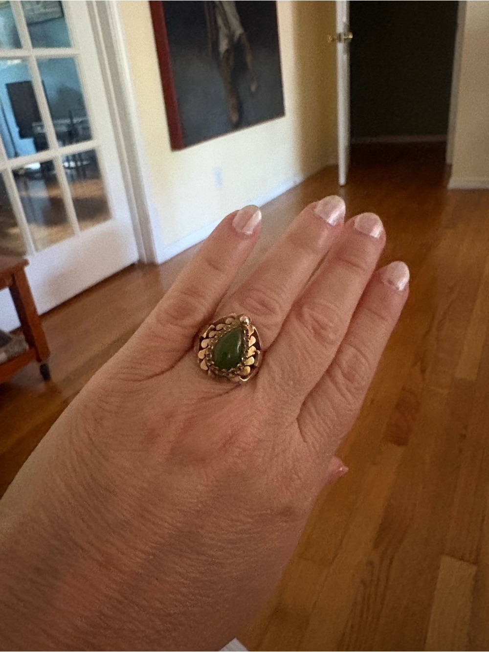Jade 14k gold ring tear drop shape with eagle like bird on sides. Vintage